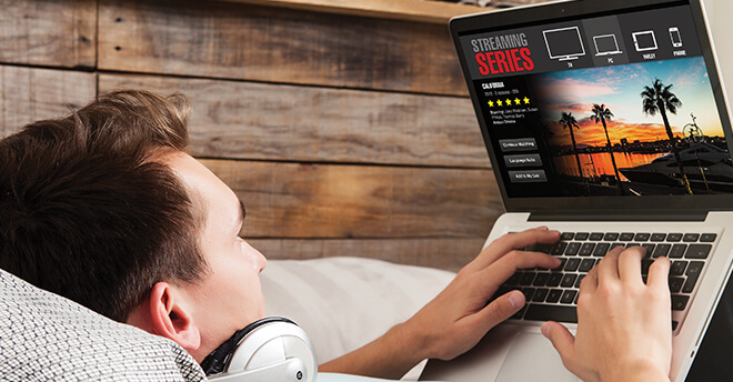 leap-lm-amp-the-future-of-media-f2 man-streaming-netflix-on-a-laptop